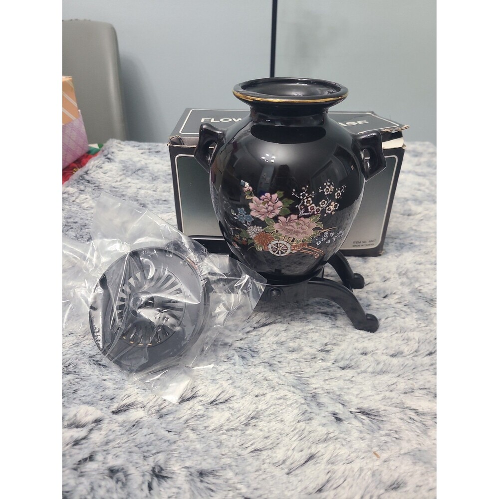 Vintage Oriental stoneware vase sits atop a 7 3/4"  by 8 1/4" long black cart